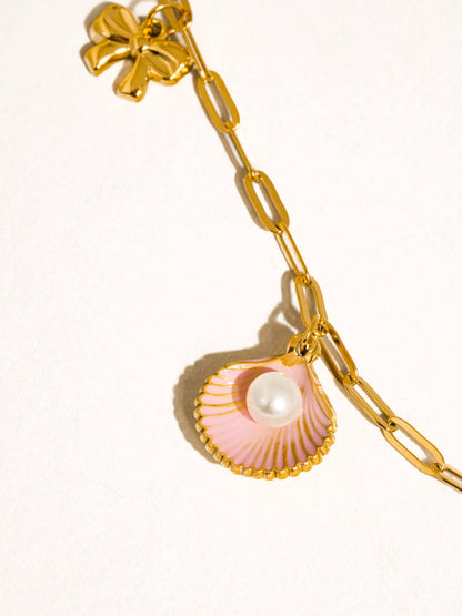 Tyla Bow Charm Necklace: Yellow Gold