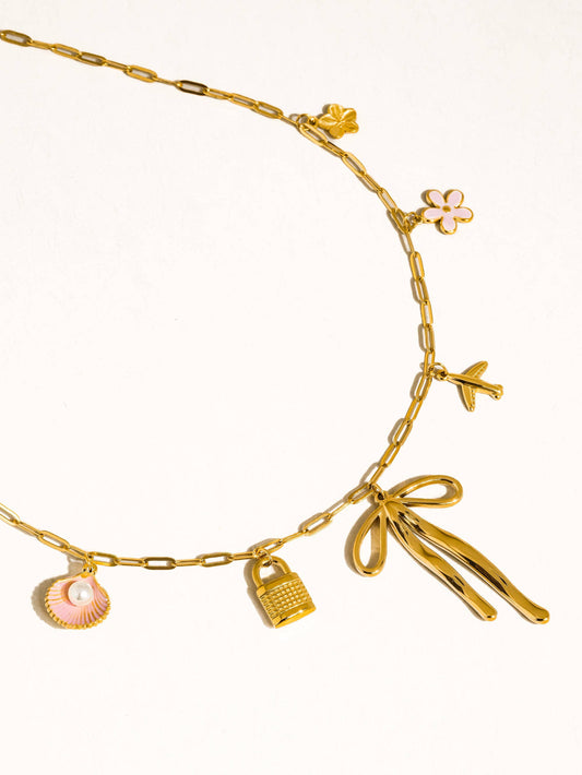 Tyla Bow Charm Necklace: Yellow Gold